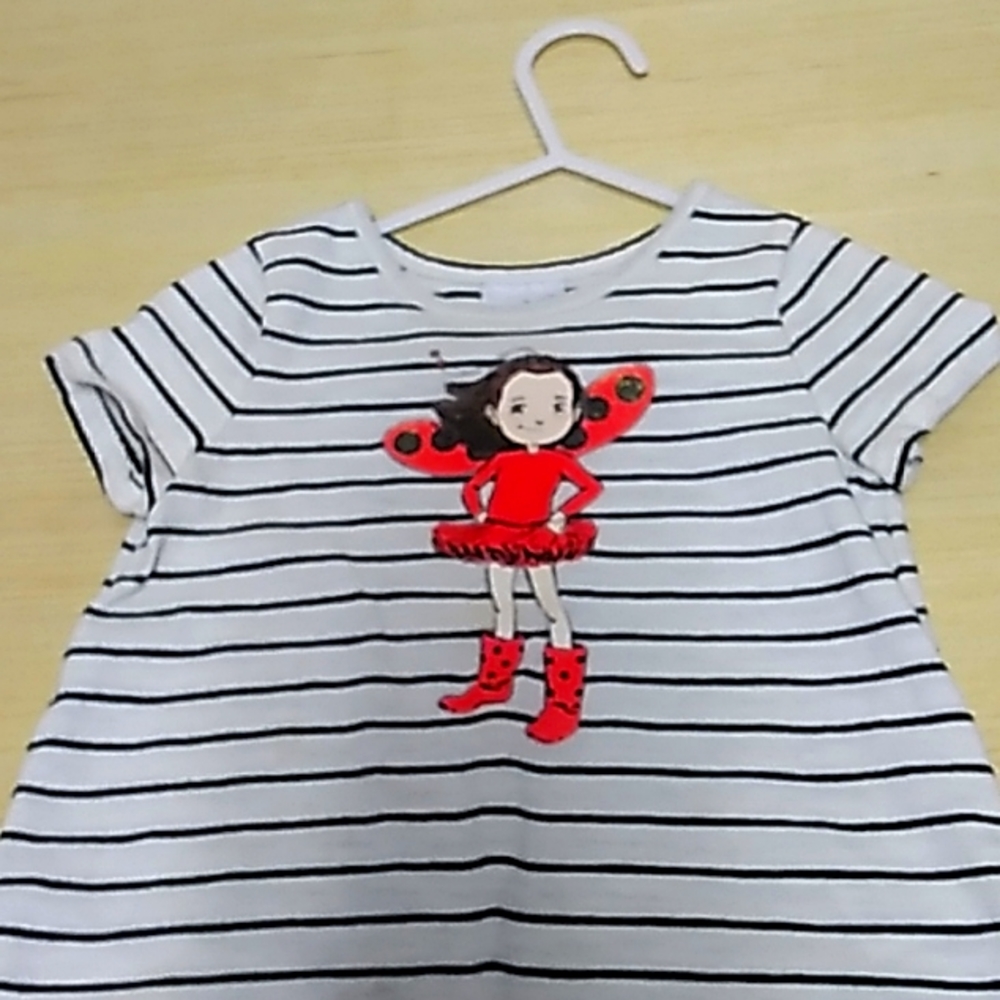 Ladybug Girl 18 month shirt in black & white w a girl ladybug on the front.
